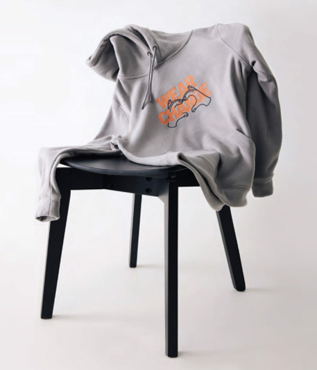 Branded sweatshirt draped over a chair Branded sweatshirt draped over a chair